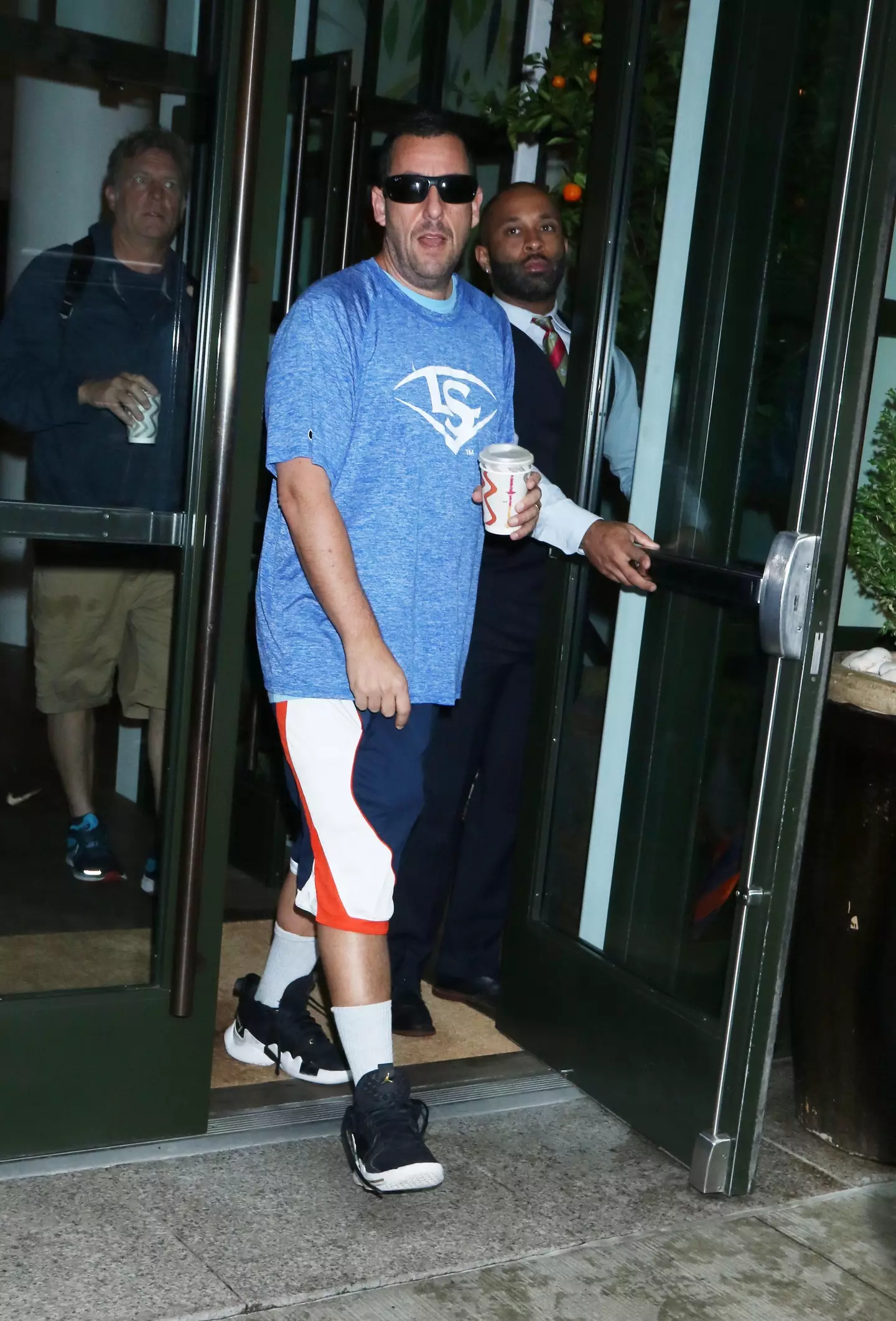 Vogue has called Adam Sandler the 'style icon of 2021'.