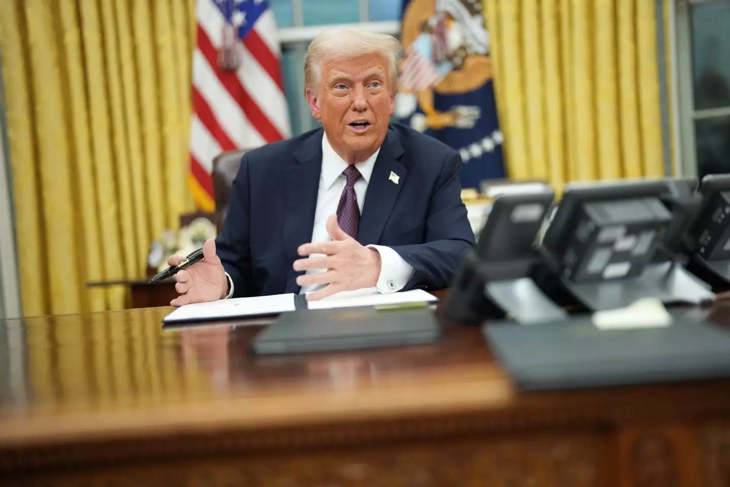 Trump got to work right away (Melina Mara / The Washington Post via Getty Images)