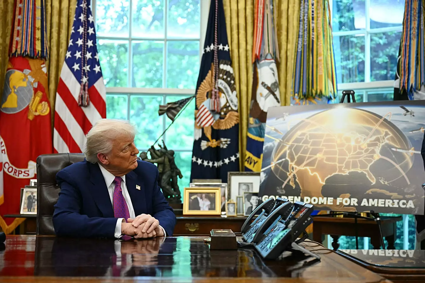 Golden Dome security project or turning America into the world's largest snowglobe? (JIM WATSON/AFP via Getty Images)