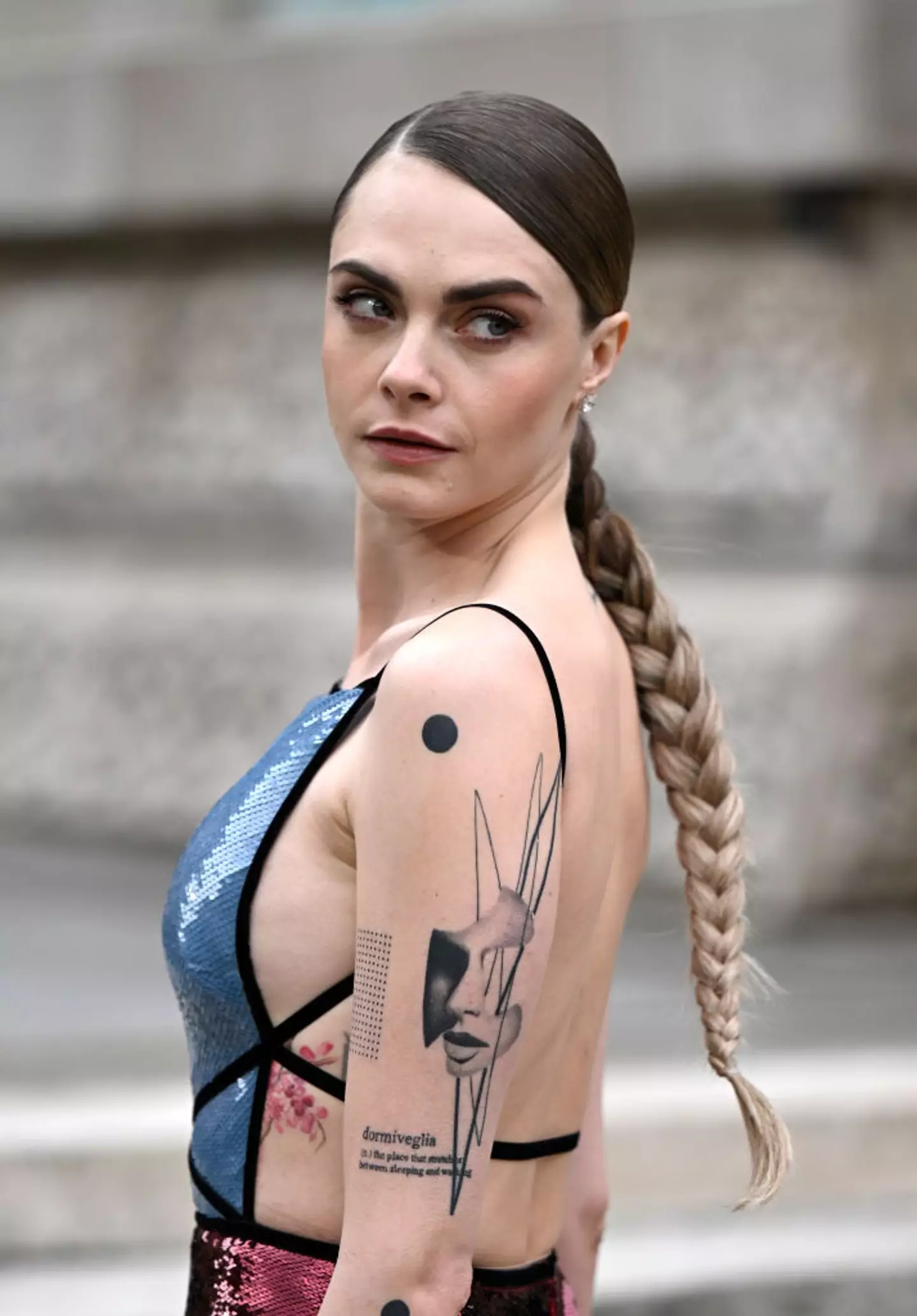Supermodel and actor Cara Delevingne has refused to take part in the 'tattoo regret' trend. (Gareth Cattermole/Getty Images)
