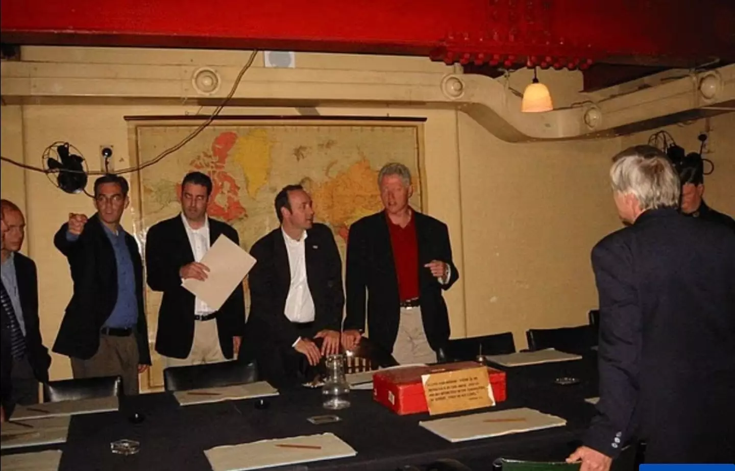 Spacey is seen next to Clinton (Department of Justice)