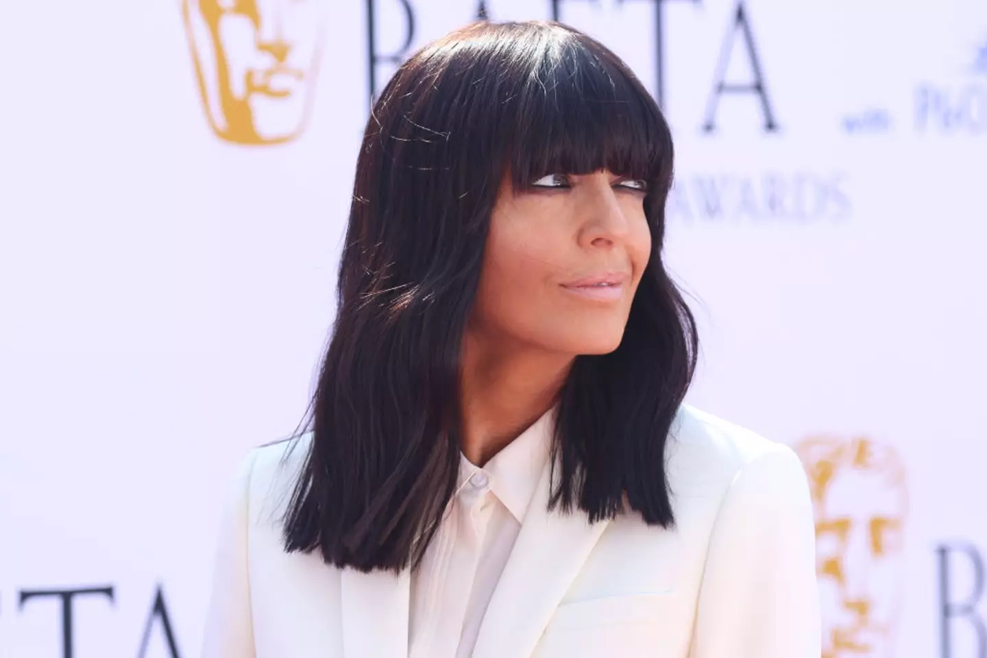 Claudia and her go-to hairstyle. (Lia Toby/Getty Images)