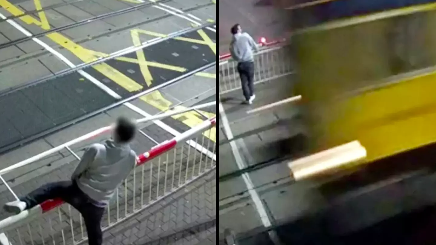 'Drunk' man jumps over crossing barrier seconds before train speeds past