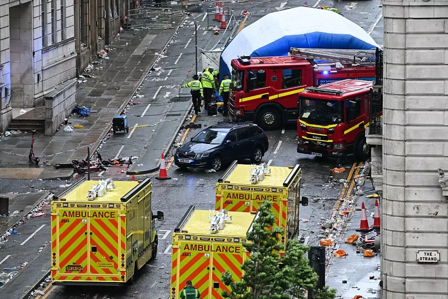 A car was seen driving through the crowds on Water Street on Bank Holiday Monday (PAUL ELLIS/AFP via Getty Images)