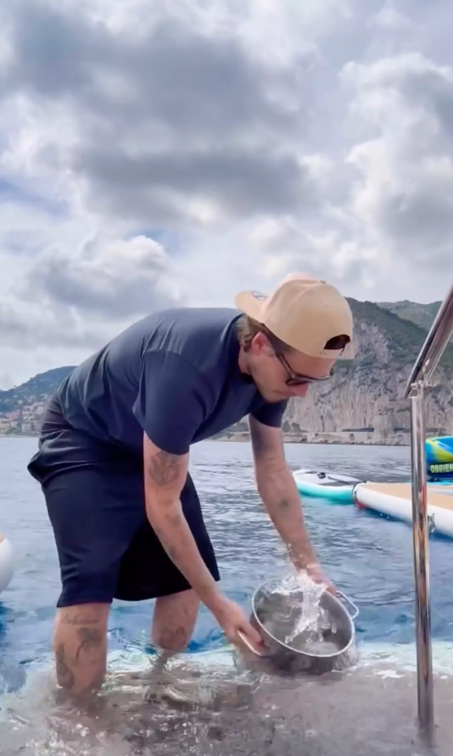 Brooklyn Beckham was seen collecting water from the sea in his latest cooking video (Instagram/@brooklynpeltzbeckham)