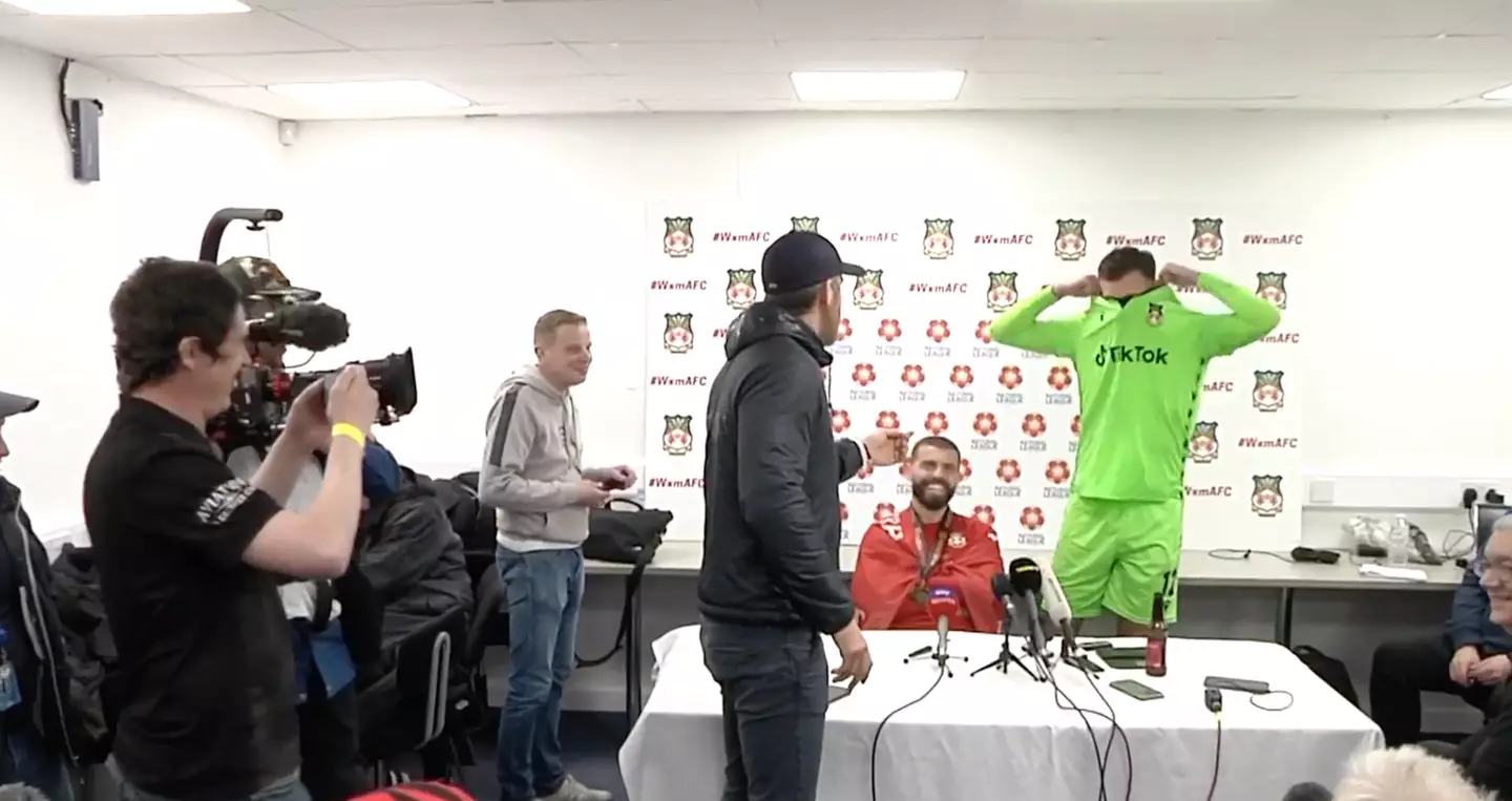 The two Wrexham players were interrupted by their owner.