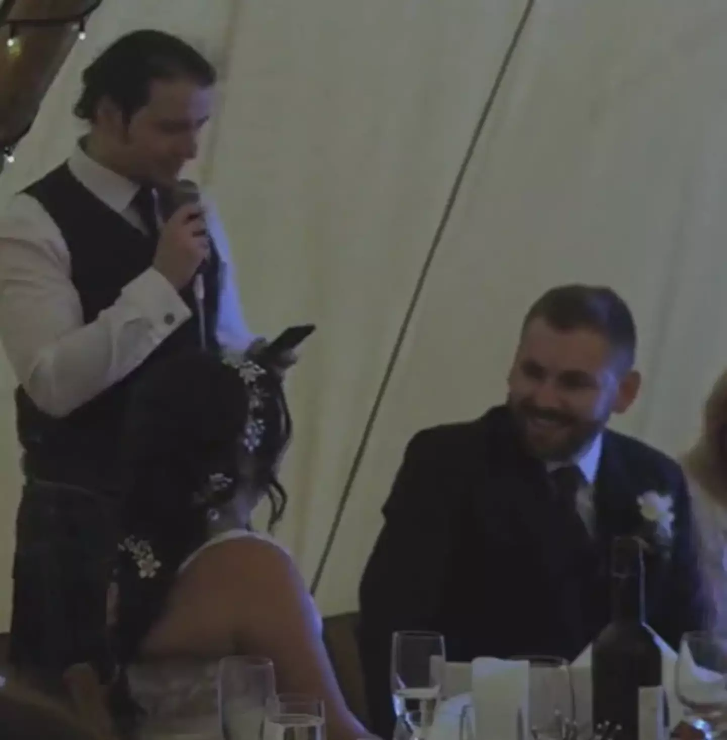 Luckily the bride and groom looked like they enjoyed the punchline.