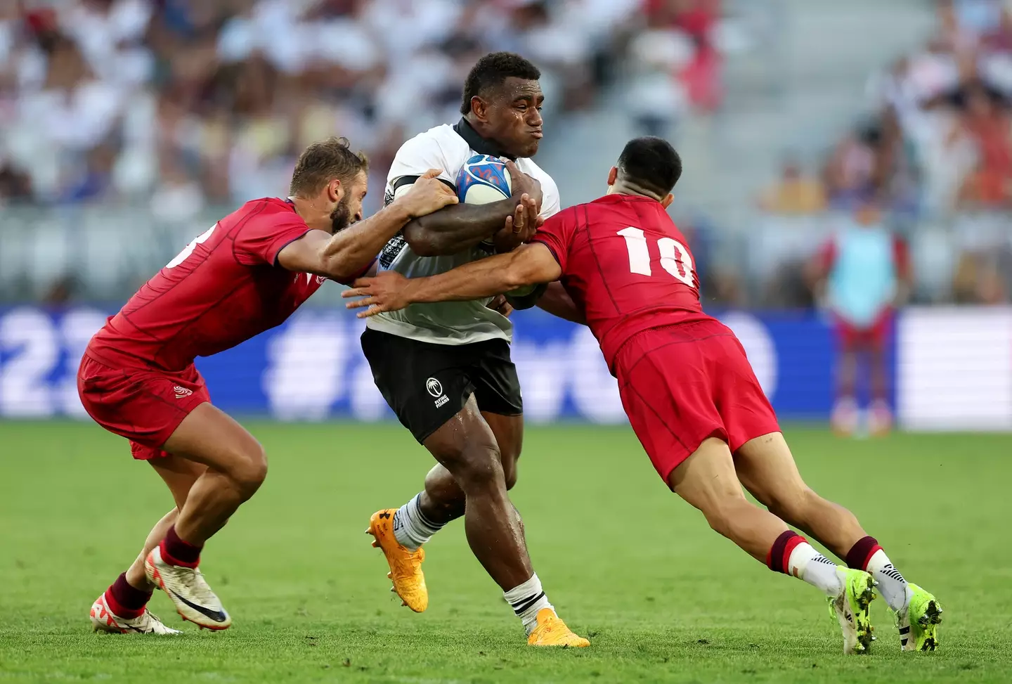 Rugby star Josua Tuisova missed his child's funeral after playing in Fiji's World Cup win over Georgia.