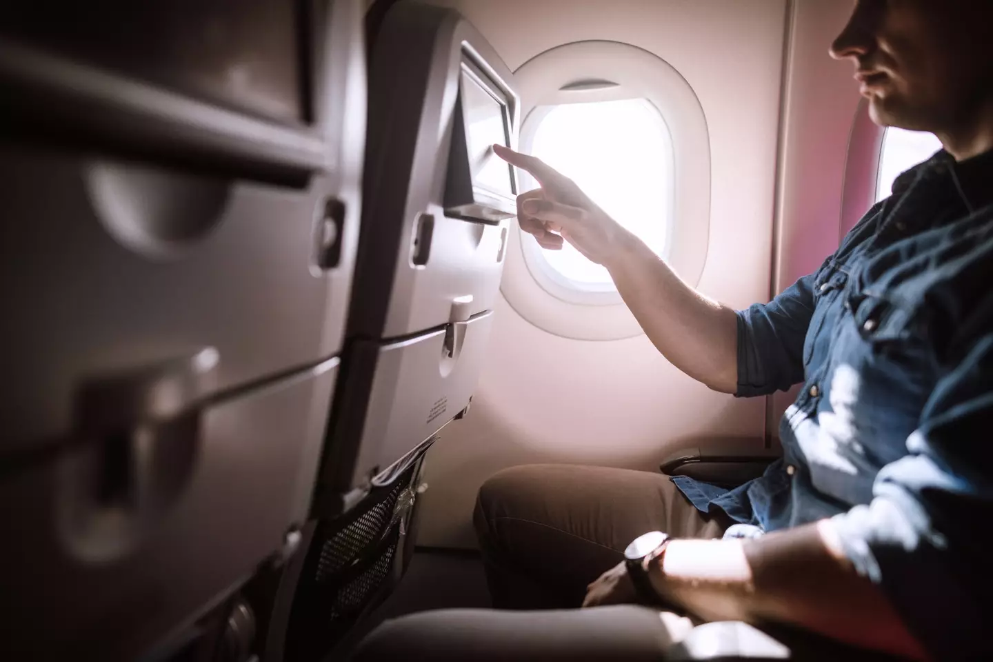 How would you deal with a sex scene coming on during an in-flight movie?