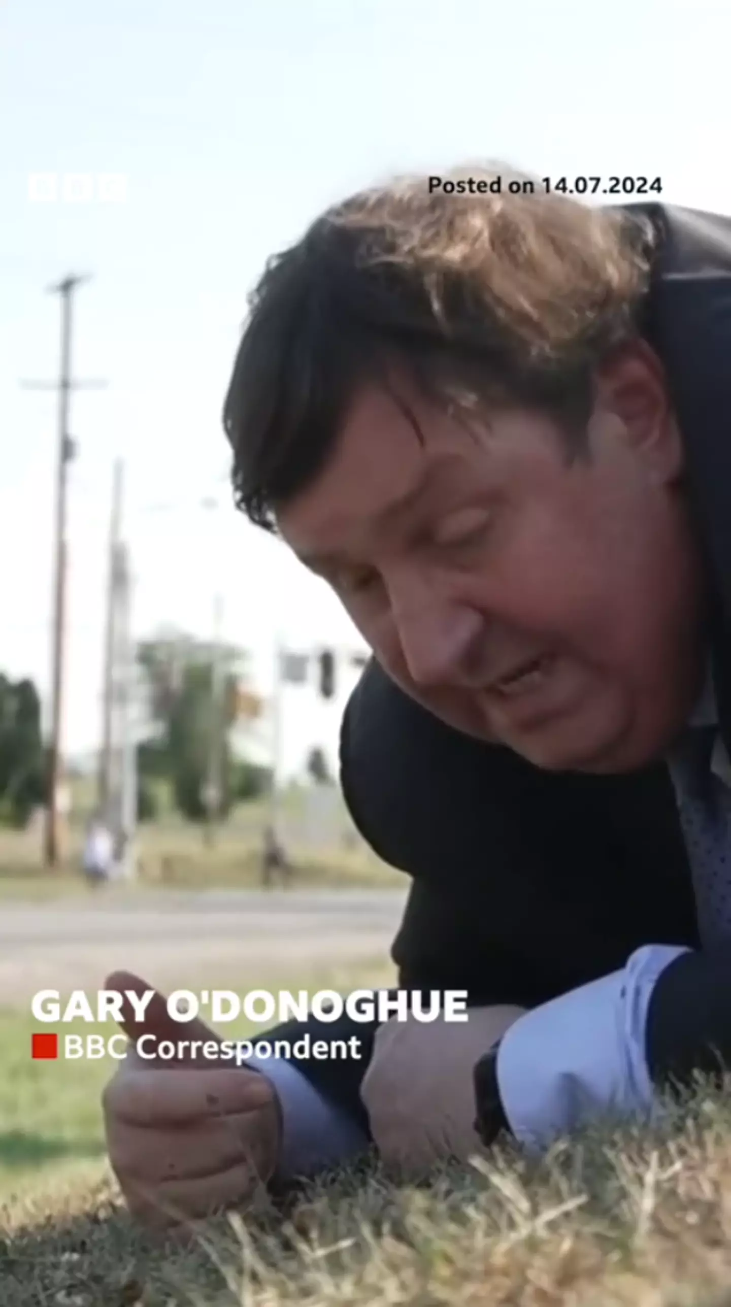 Many defended the reporter for remaining on the ground. (BBC)