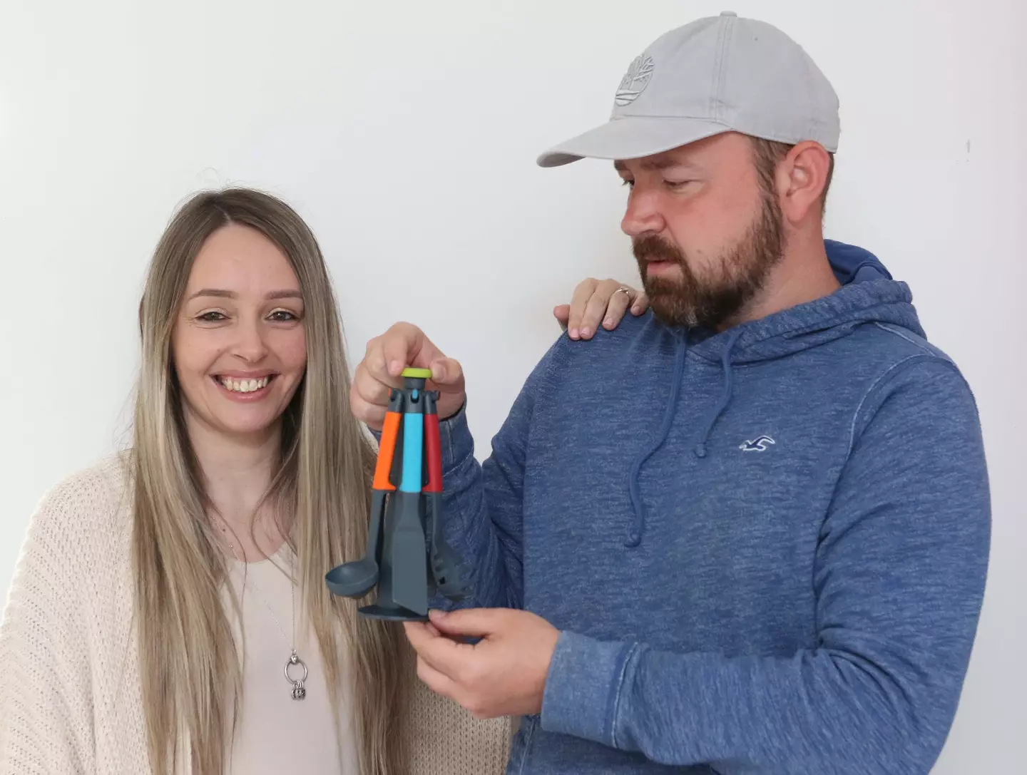 Hannah and David with their 'tiny' kitchen set.