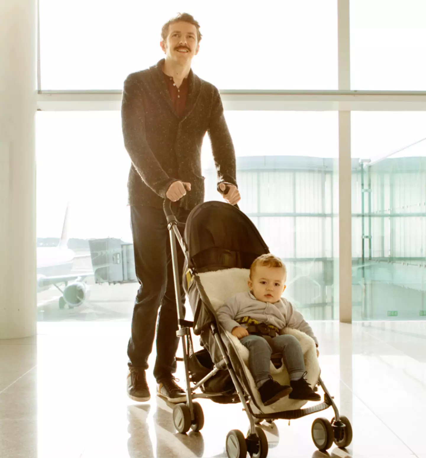 The dad-of-two said bringing a pushchair to the airport speeds things up.