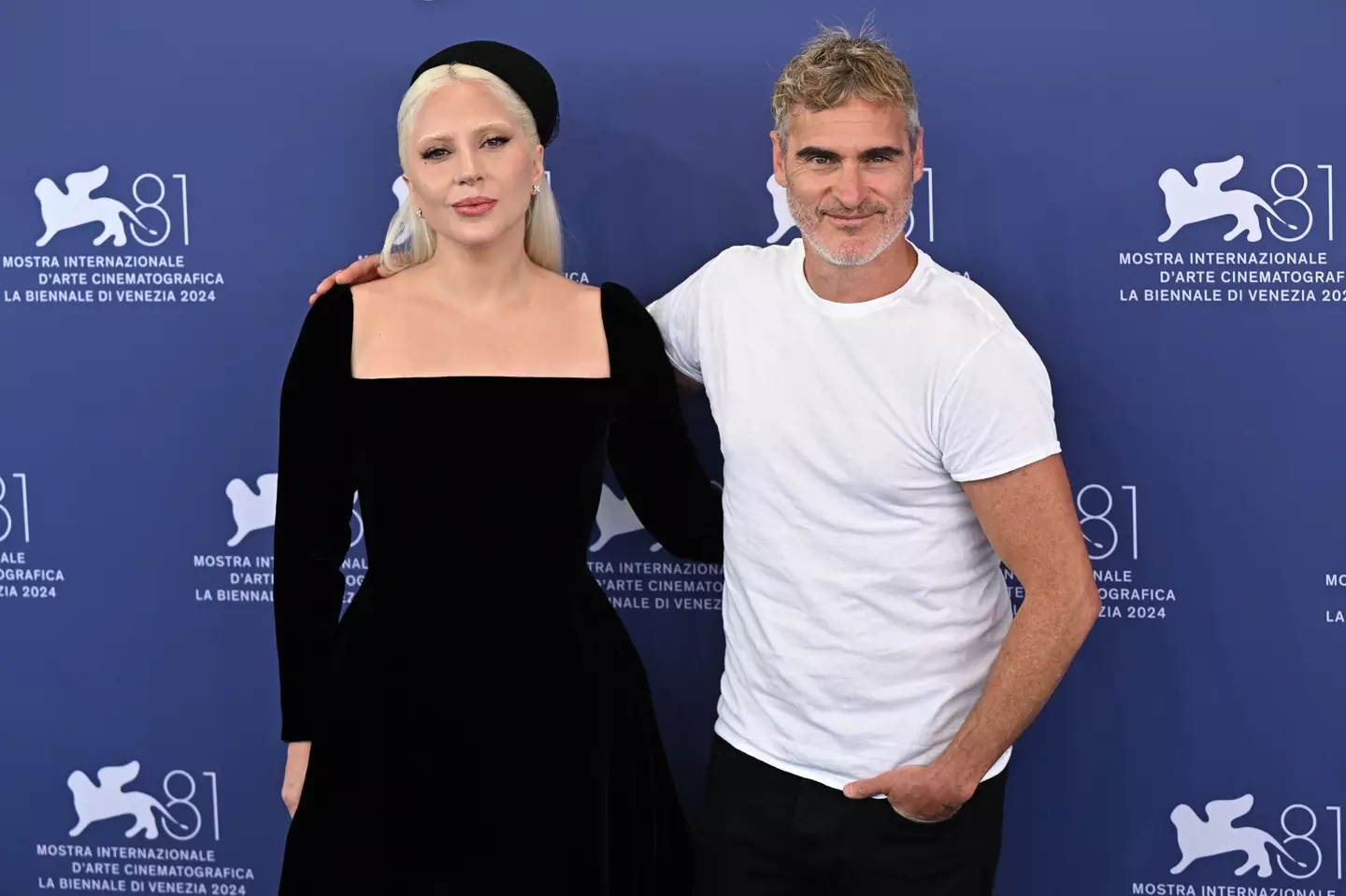 Joaquin Phoenix had a word with Lady Gaga after getting a standing ovation for Joker: Folie à Deux (Stephane Cardinale - Corbis/Corbis via Getty Images)