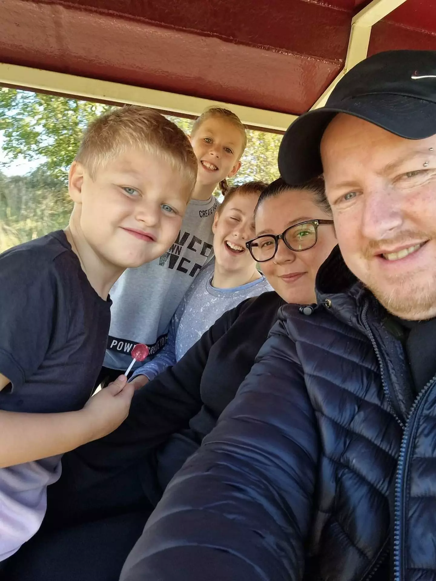 Robert Mansfield with partner Stephanie Scott and their kids.