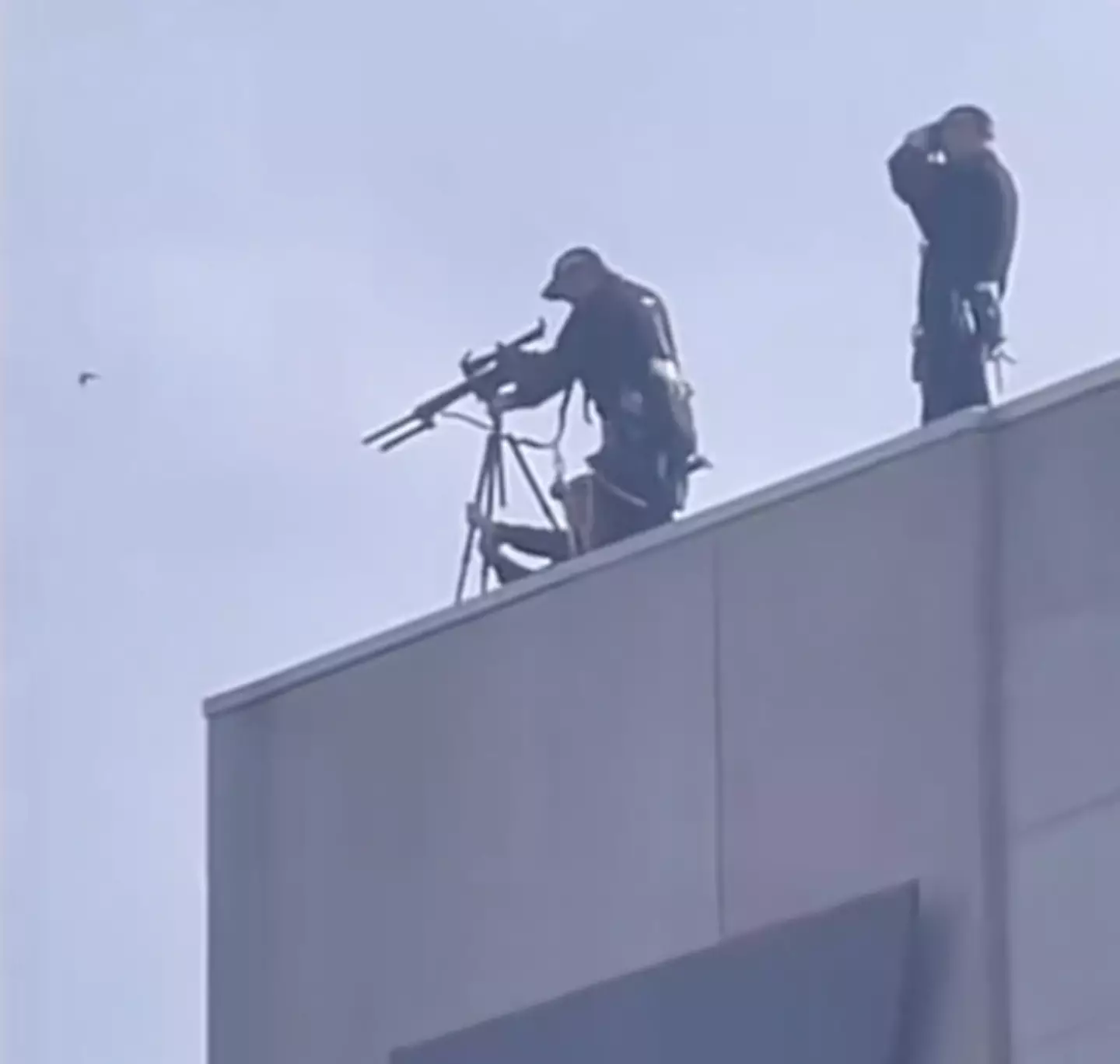 Marksmen were see in Edinburgh amid the Queen's procession.
