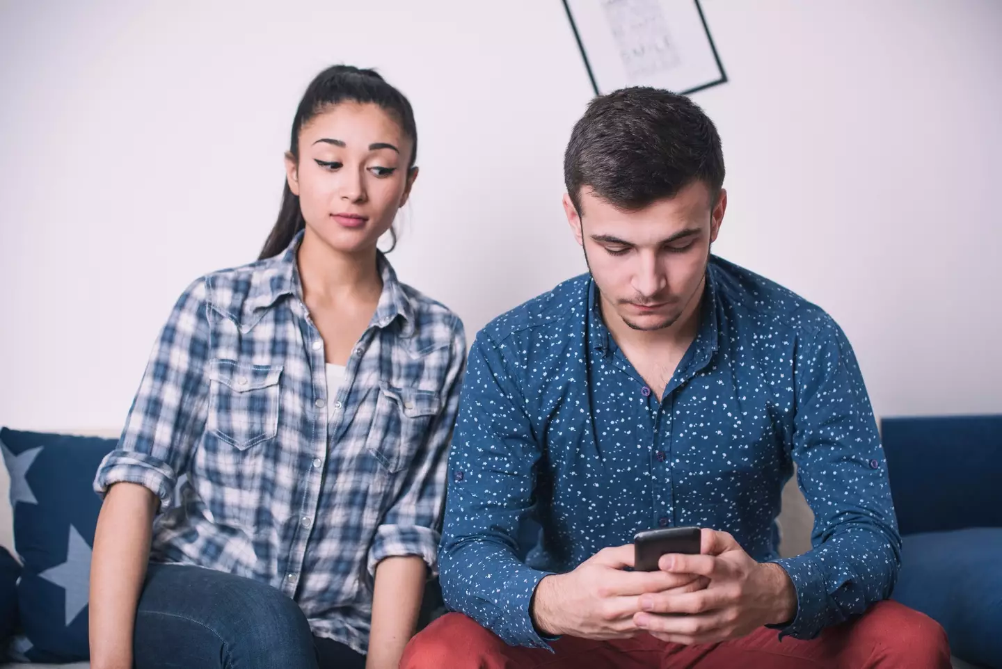 "Babe, is there a reason you're following 100 fitness girl accounts on Instagram?" (Getty Stock Photo)