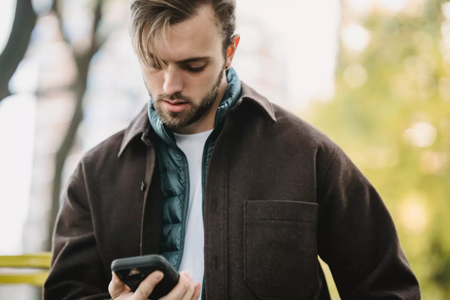 Shielding their phone from you may mean they're hiding something from you.