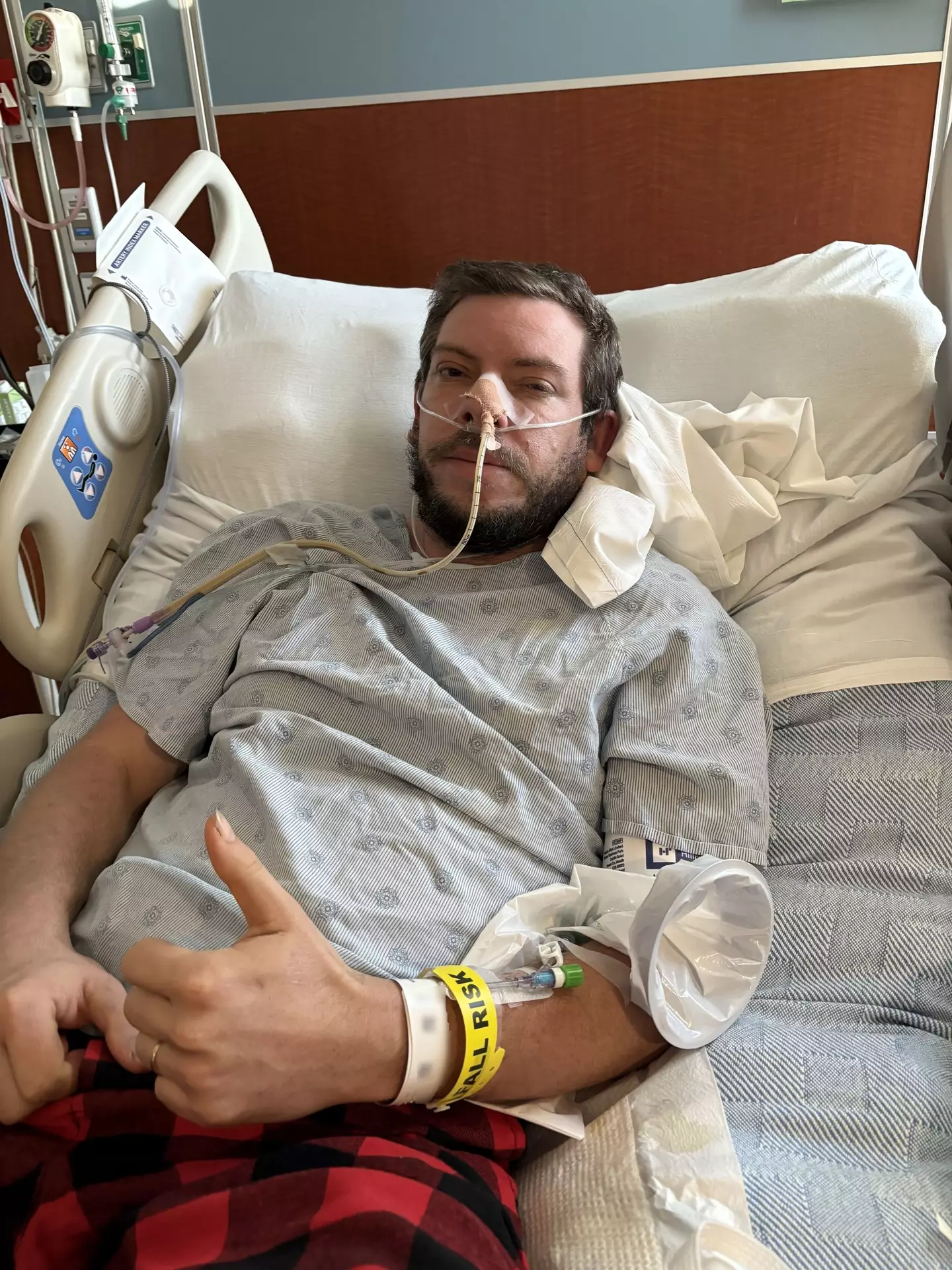 The young and healthy dad nearly died from 'sneezing to hard' (Kennedy News and Media)