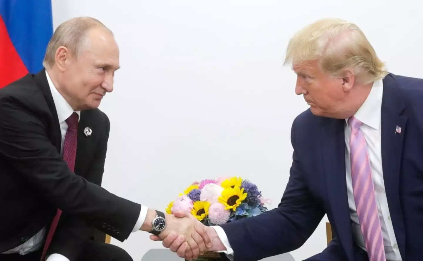 Vladimir Putin gifted Donald Trump a new portrait (Kremlin Press Office / Handout/Anadolu Agency/Getty Images)