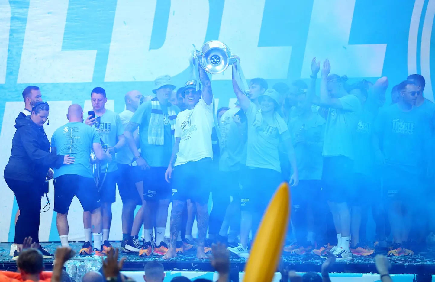 City staff and players celebrating with fans during yesterday's trophy parade.