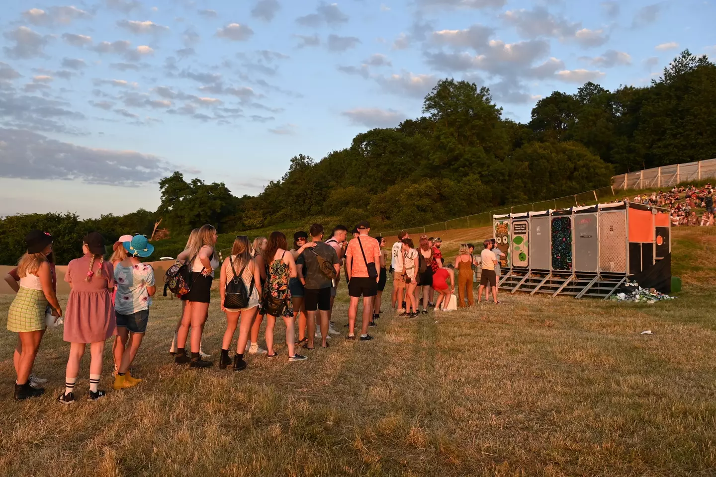 There are actual toilets available all over the site. (Kate Green/Getty Images)