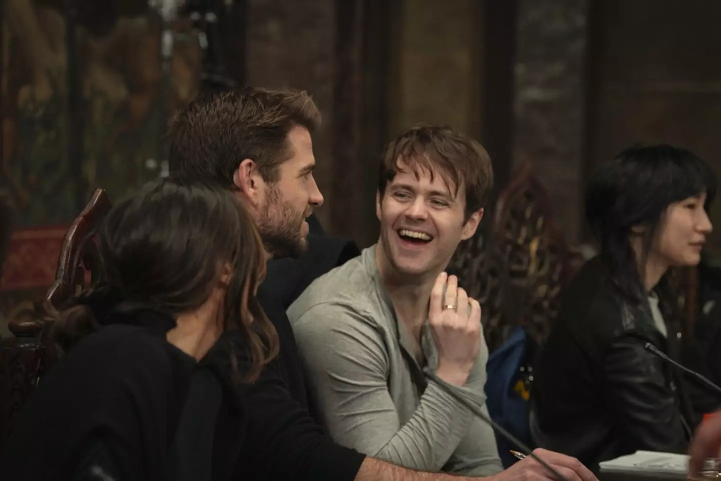 Anya Chalotra, Liam Hemsworth, Joey Batey and Meng'er Zhang at a table read for The Witcher season four. (Netflix)