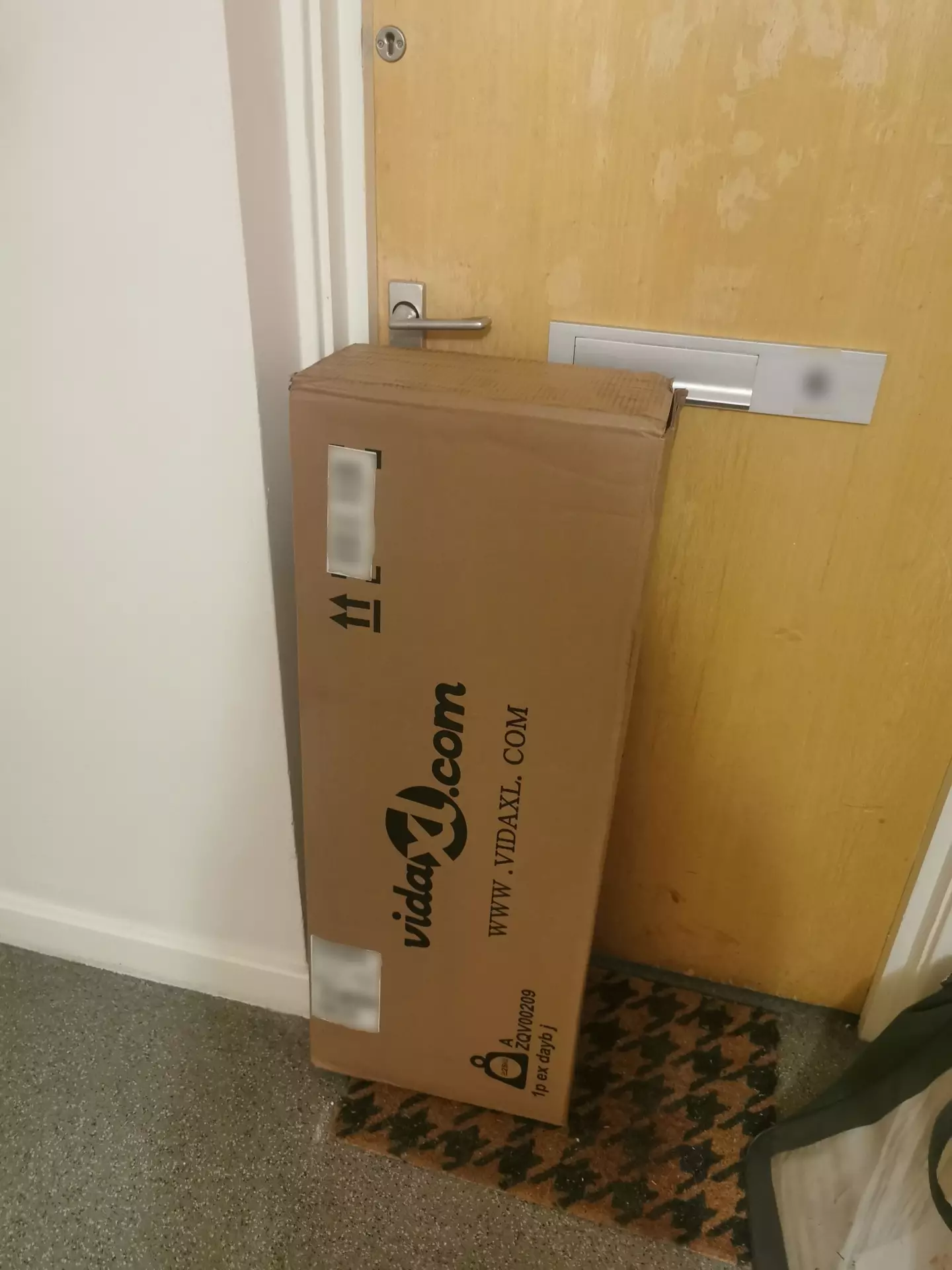 The parcel was placed under the door handle, trapping the pensioner inside.