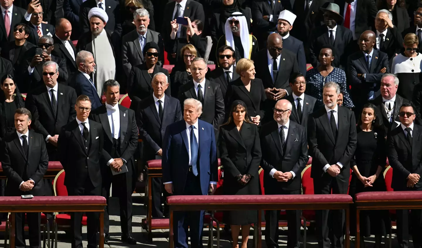Viewers could spot Donald Trump a mile off among the sea of black suits (MANDEL NGAN/AFP via Getty Images)