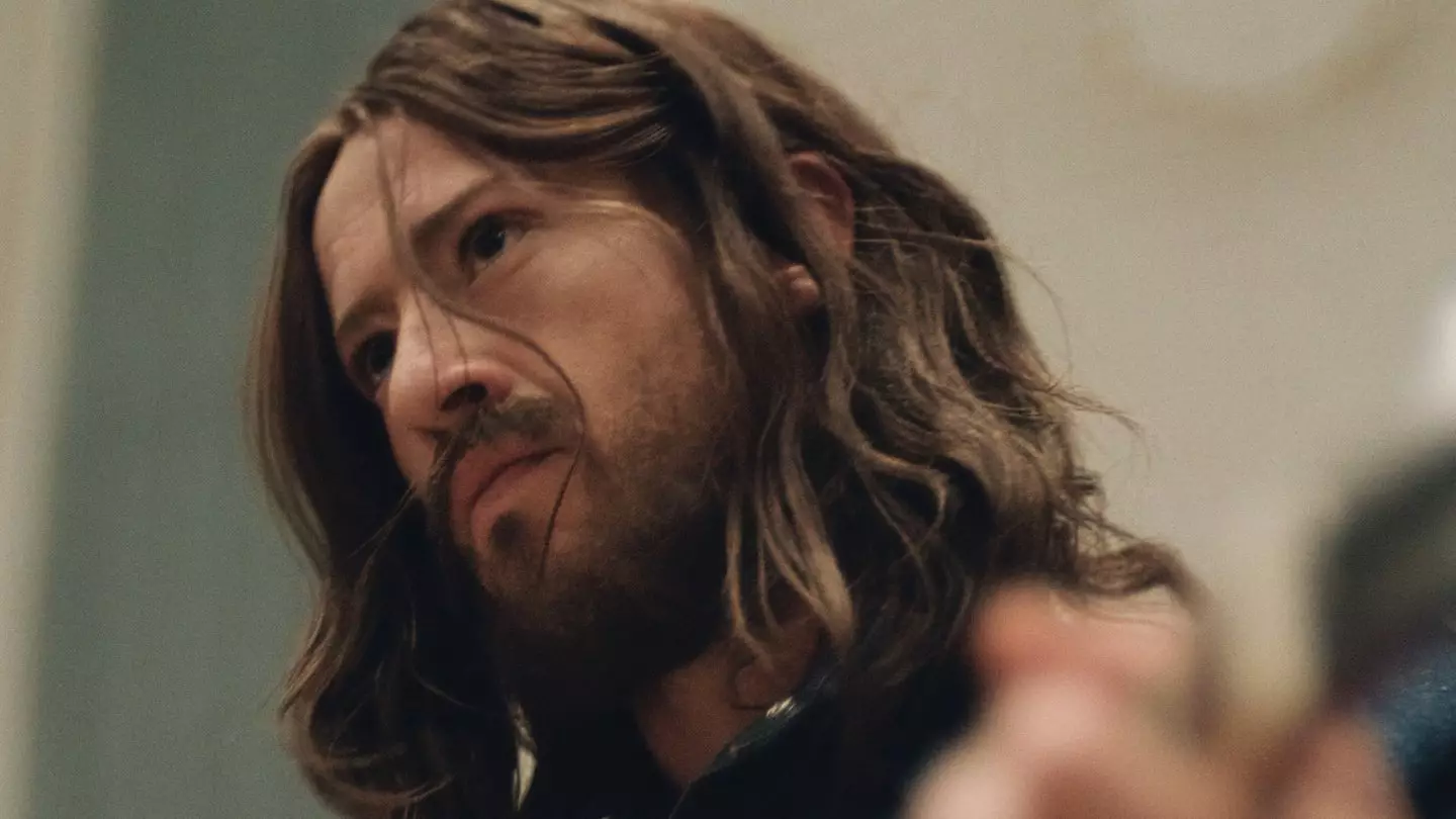 Joseph Quinn as George Harrison (Sony)