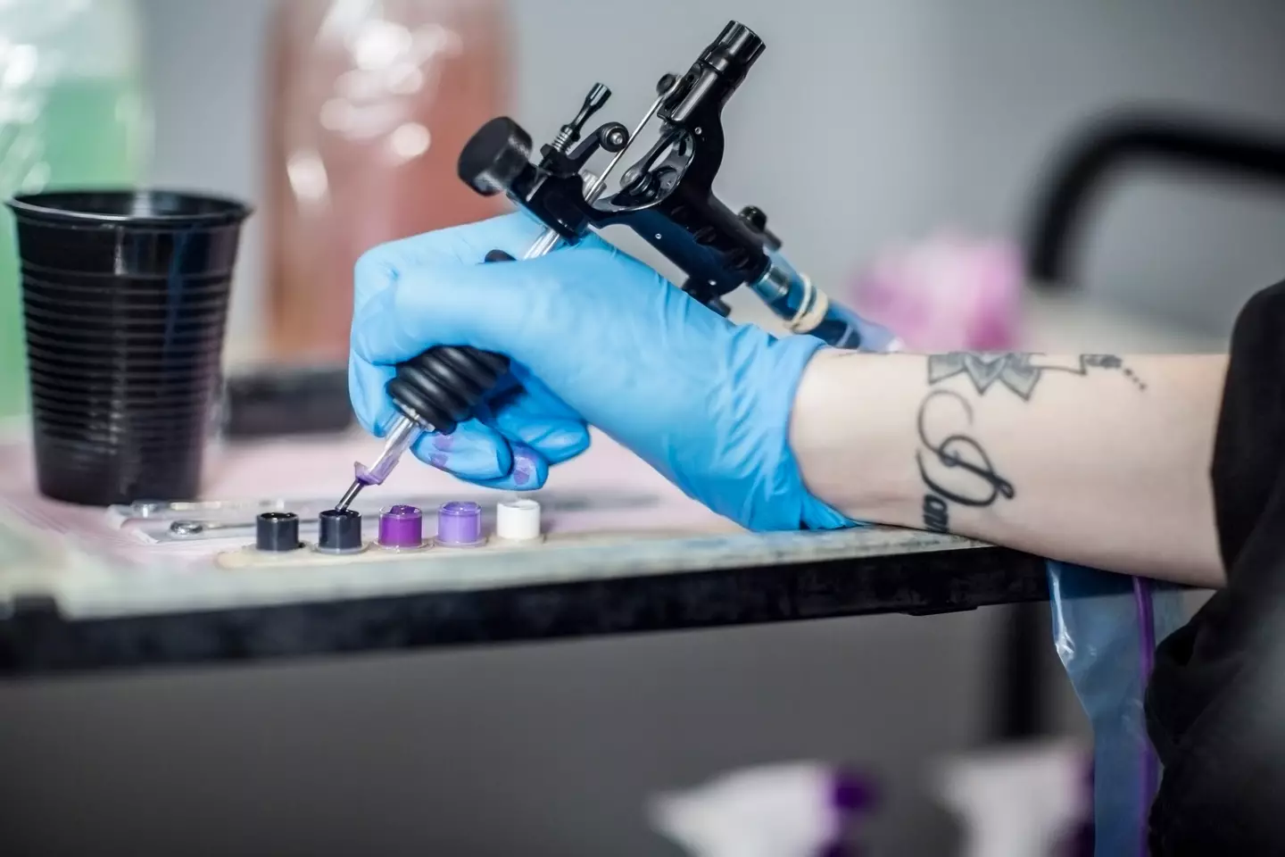 The Austrian woman explained she got blackout tattoos to cover up designs she no longer liked (Getty Stock Image)