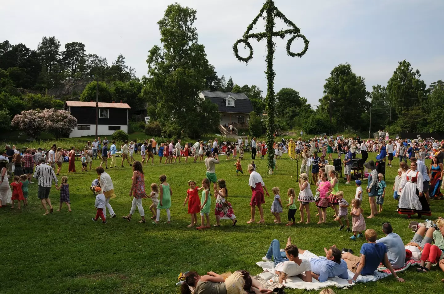 Part of the celebrations sees people dancing around a maypole.