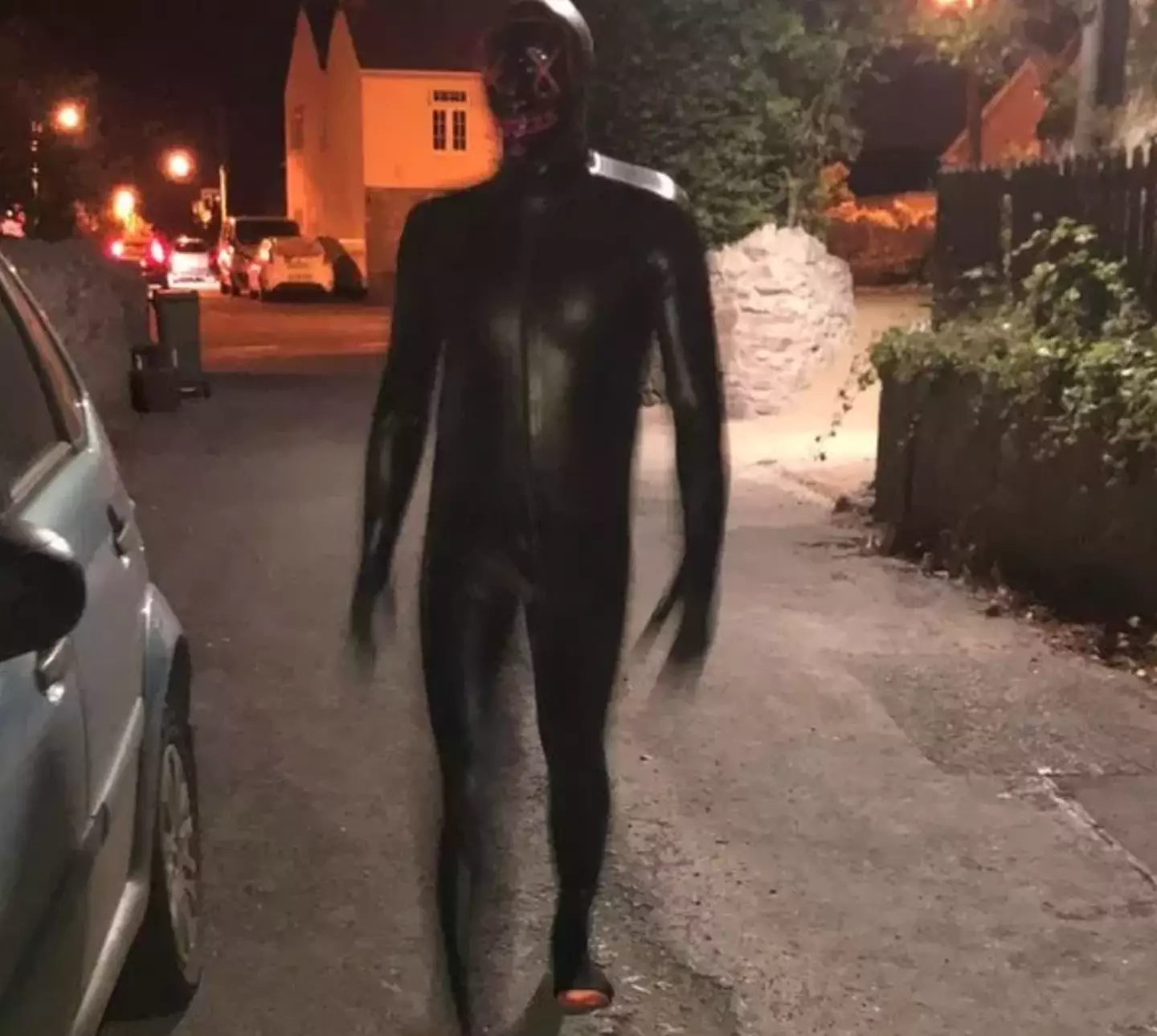 The creepy suit has caused concern in the area.