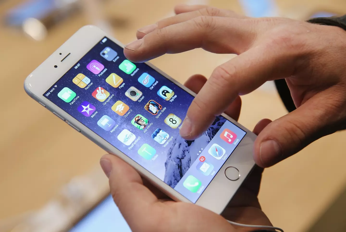 Brits who owned an affected model, such as the iPhone 6 (pictured), may be owed some compensation (Sean Gallup/Getty Images)