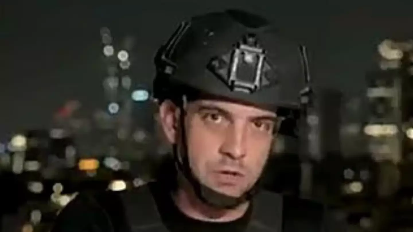 Shocking moment reporter is forced to run for cover as Iran fire attack on Israel