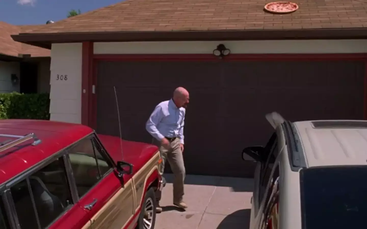 Bryan Cranston's Walter White outside the house.