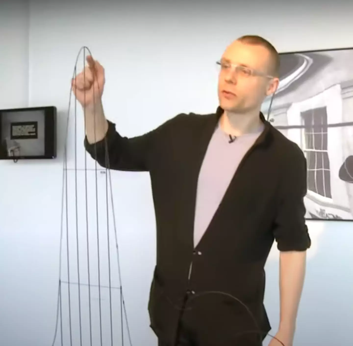 Julijonas Urbonas and his model of the Euthanasia Coaster (YouTube / Science Gallery Dublin)