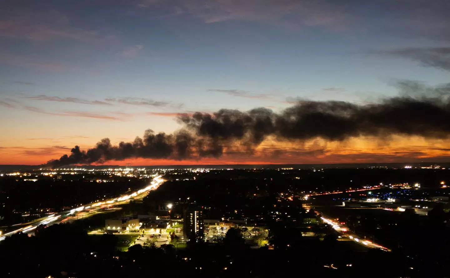 The plane exploded into a large fireball and the smoke billowed across the skies (LEANDRO LOZADA/AFP via Getty Images)