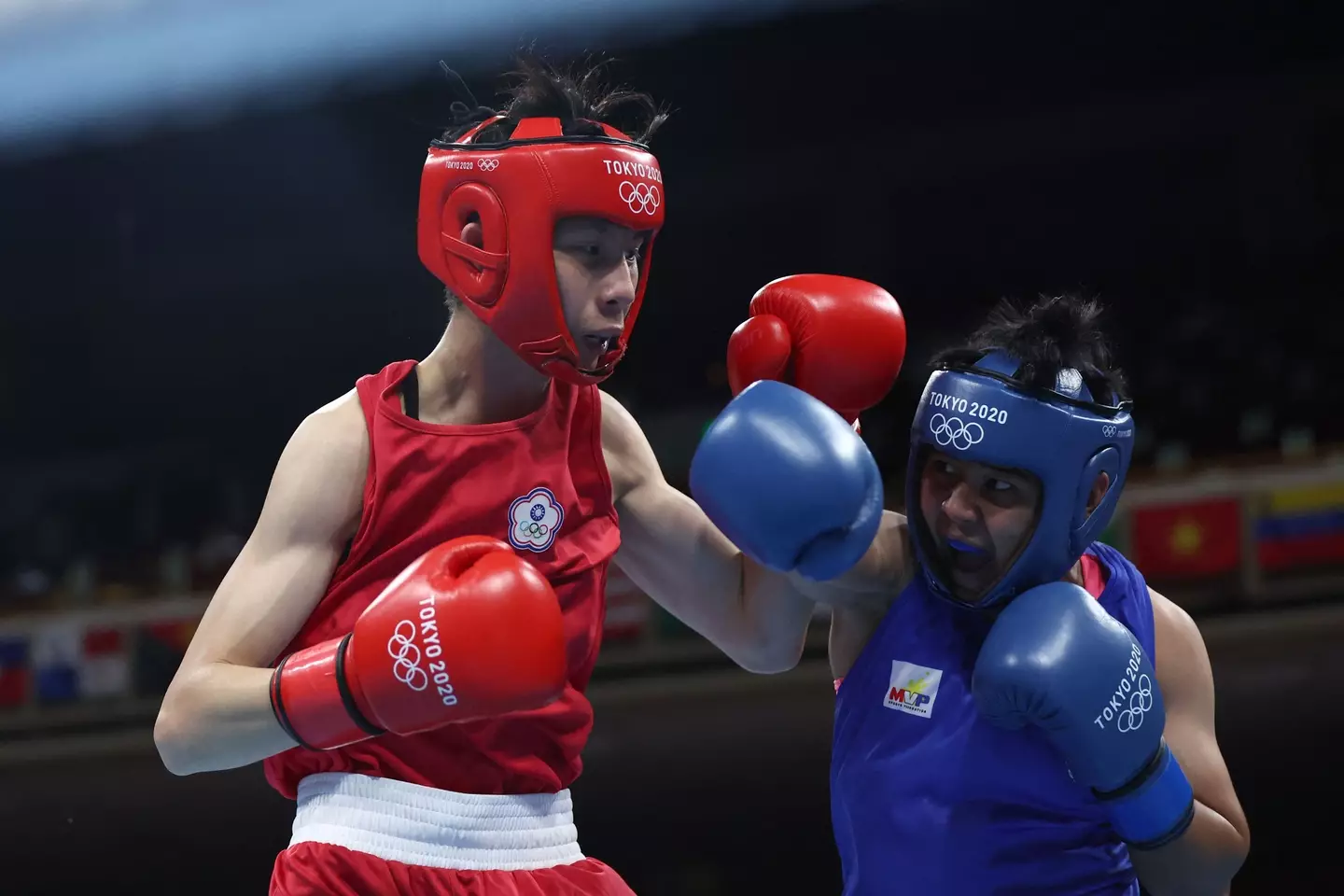 Like Khelif, Lin (wearing red) has also previously competed at the Olympics without issue. (BUDA MENDES/POOL/AFP via Getty Images)