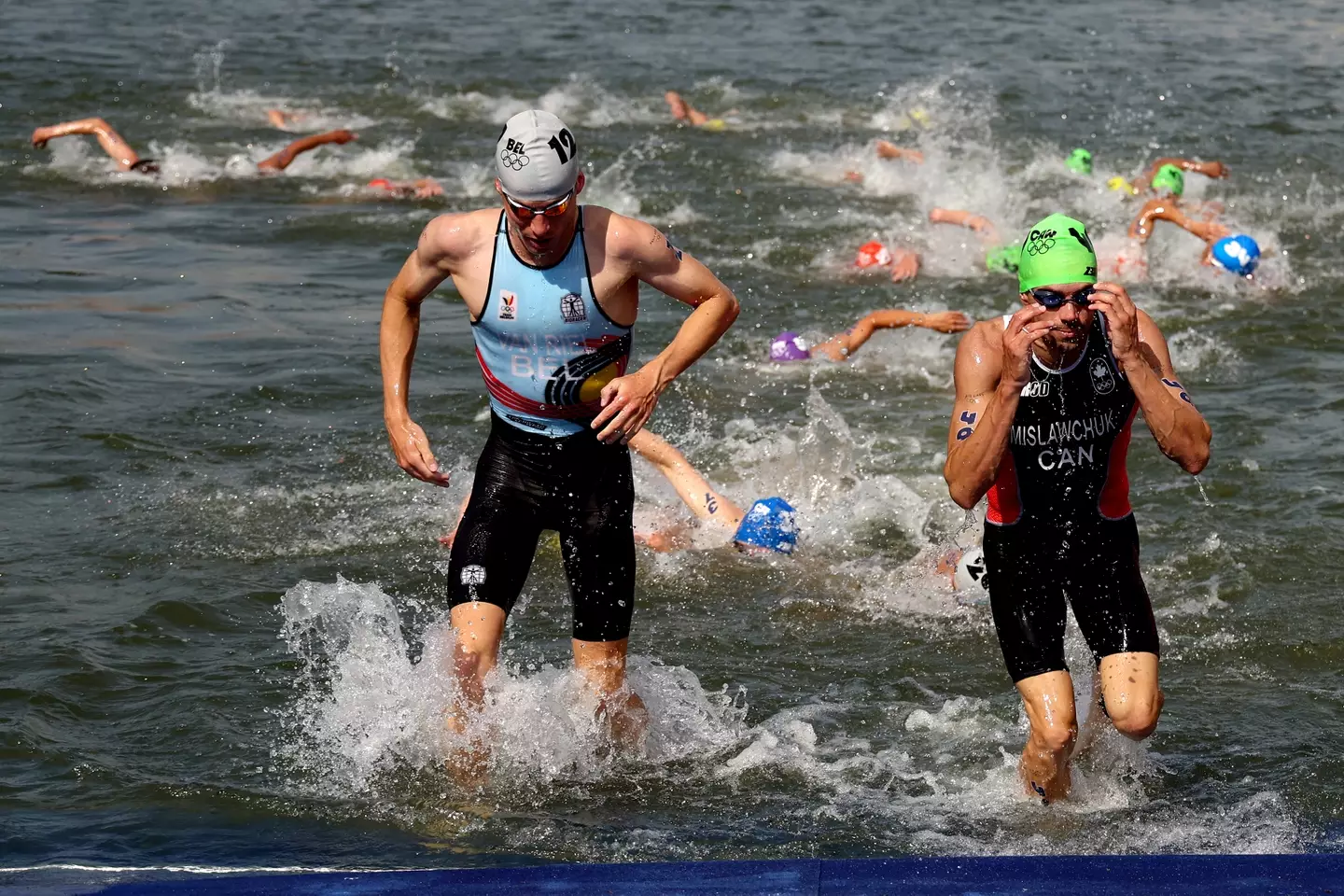 The Triathletes took a dip in the dirty water of the Seine. (Ezra Shaw/Getty Images)