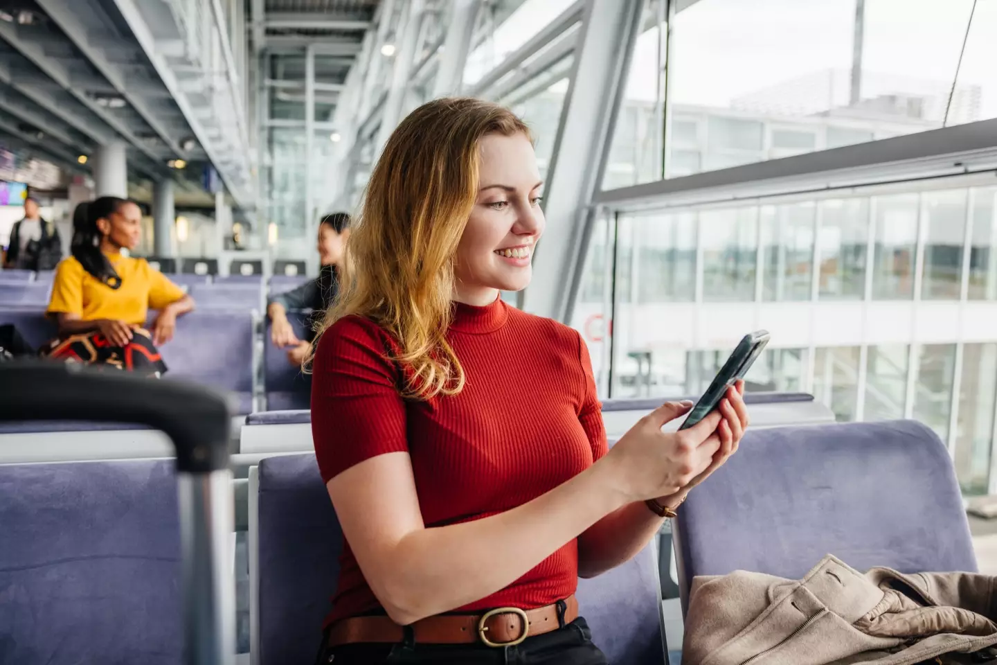According to psychology, that red top is really going to help her journey. (Getty Stock Photo)