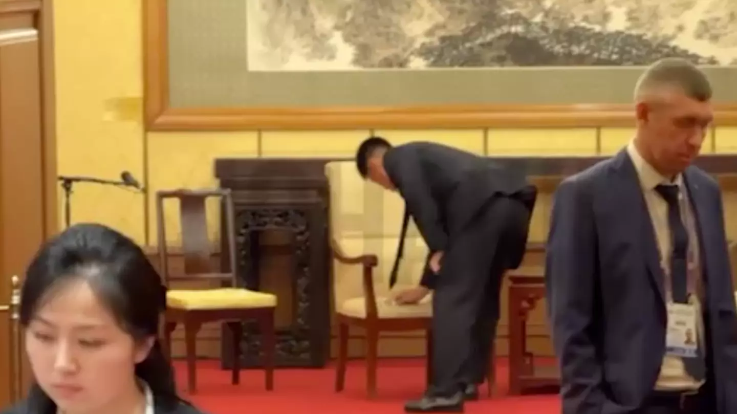 Bizarre theories emerge as Kim Jong Un's staff filmed ‘destroying all traces of his presence' after meeting Putin