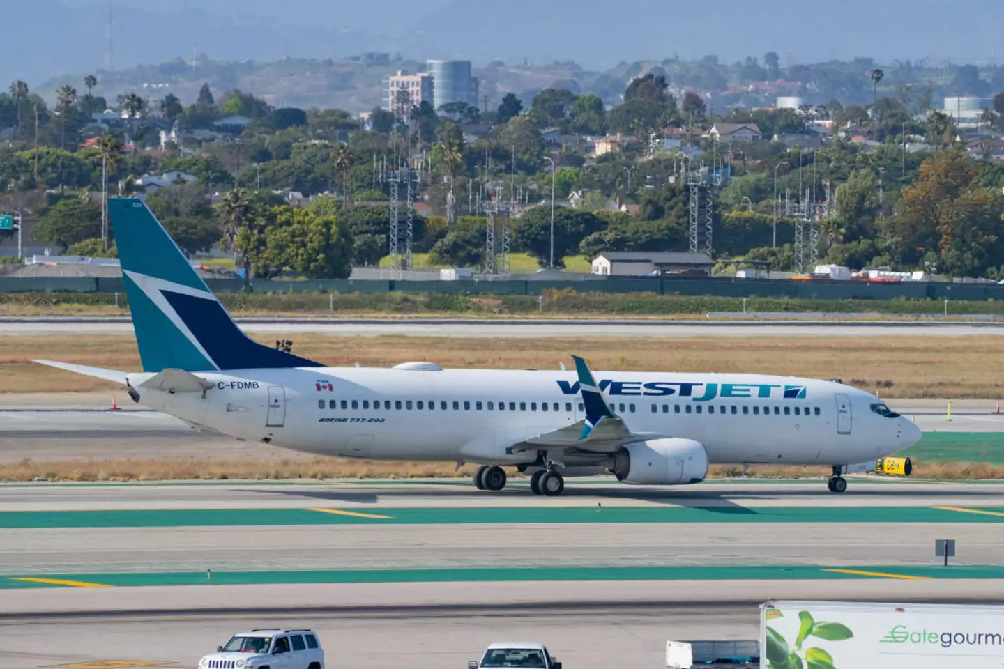 WestJet argues the ticket will allow travellers to save money. (AaronP/Bauer-Griffin/GC Images)