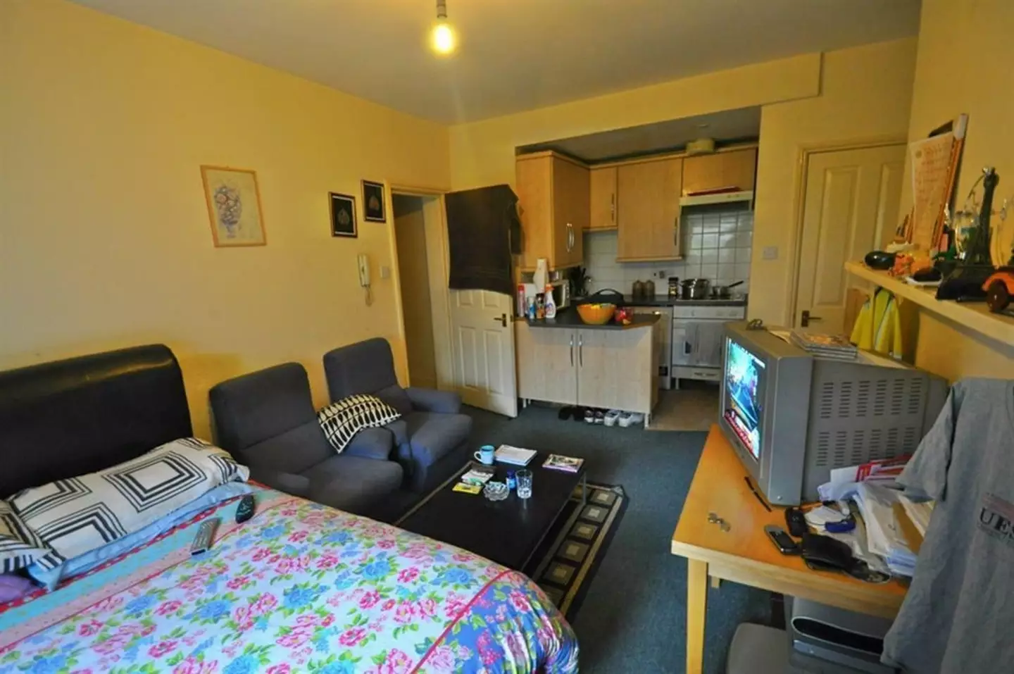 The small flat has a separate shower and toilet.