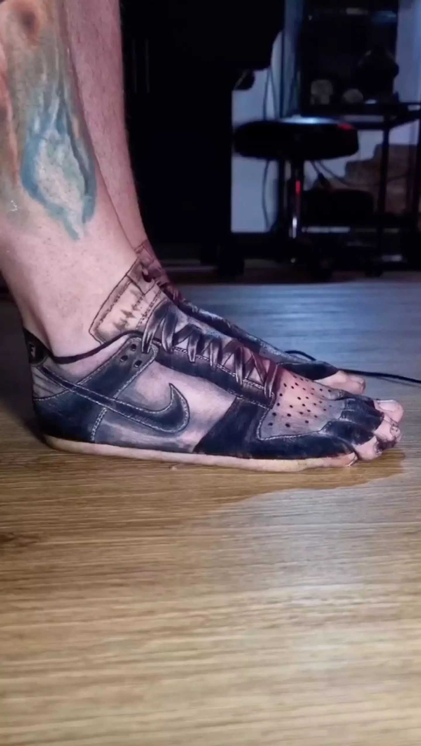 The bloke got both his feet tattoo.