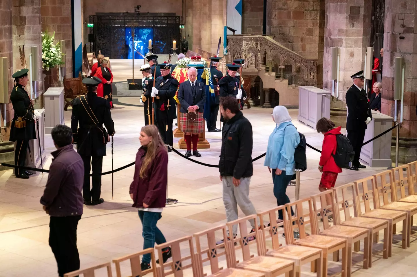 Some people thought the tradition was strange as members of the Royal Family stood around the coffin silently.