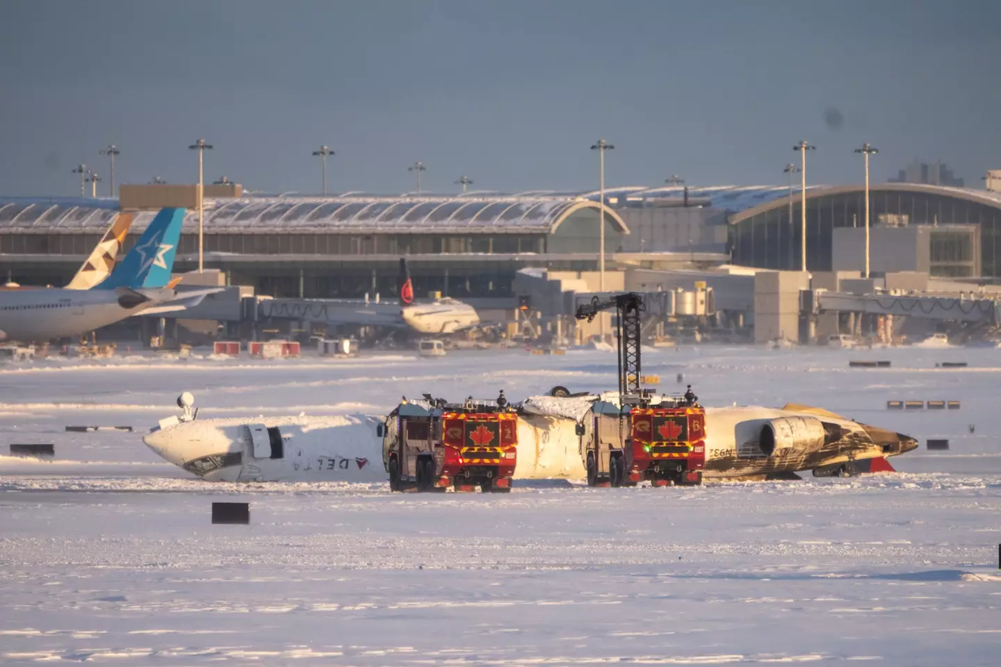 The plane hit the runway and flipped over, there have been no fatalities reported (Katherine KY Cheng/Getty Images)