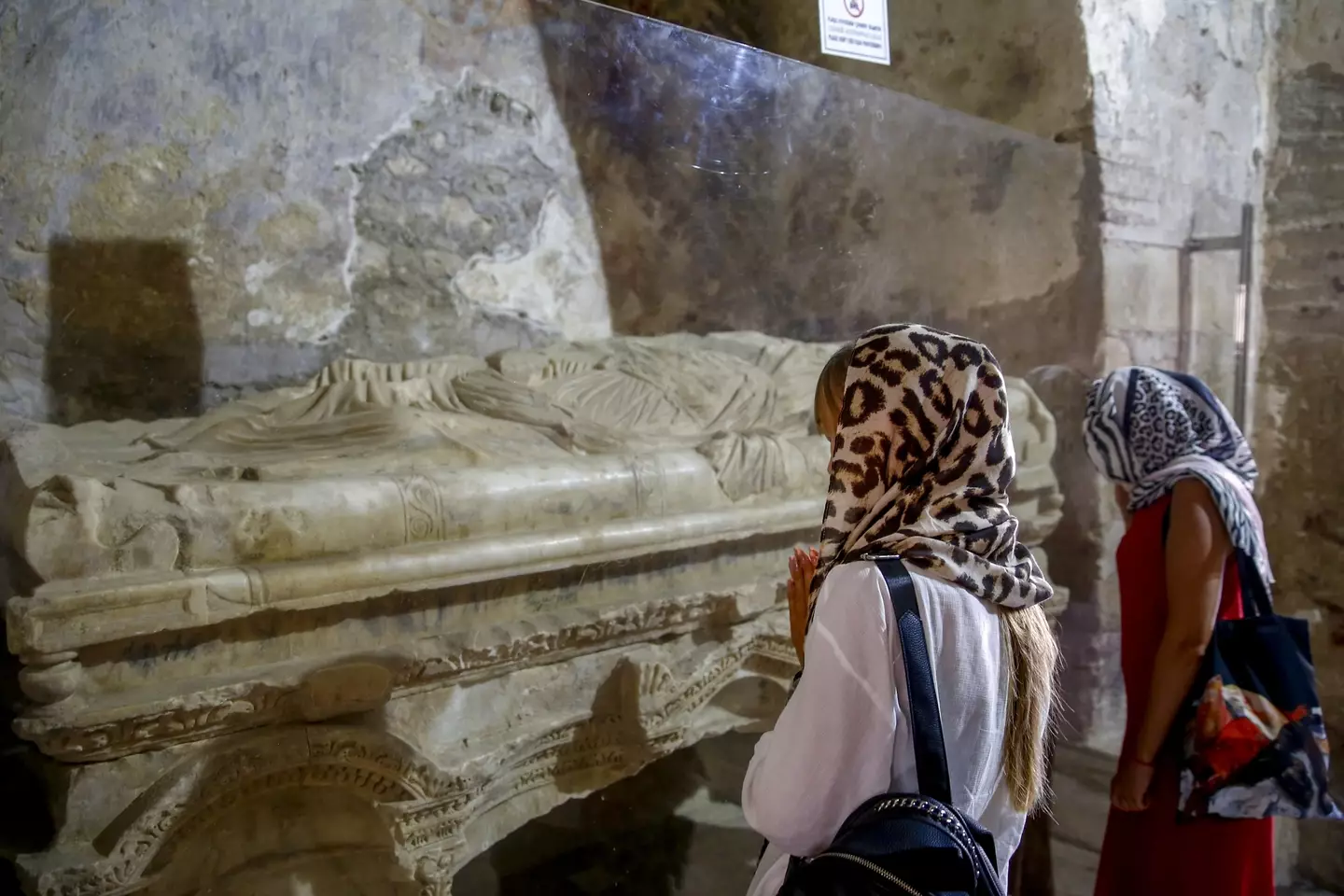 People praying at St. Nicholas Church in Demre district of Antalya, Turkey.