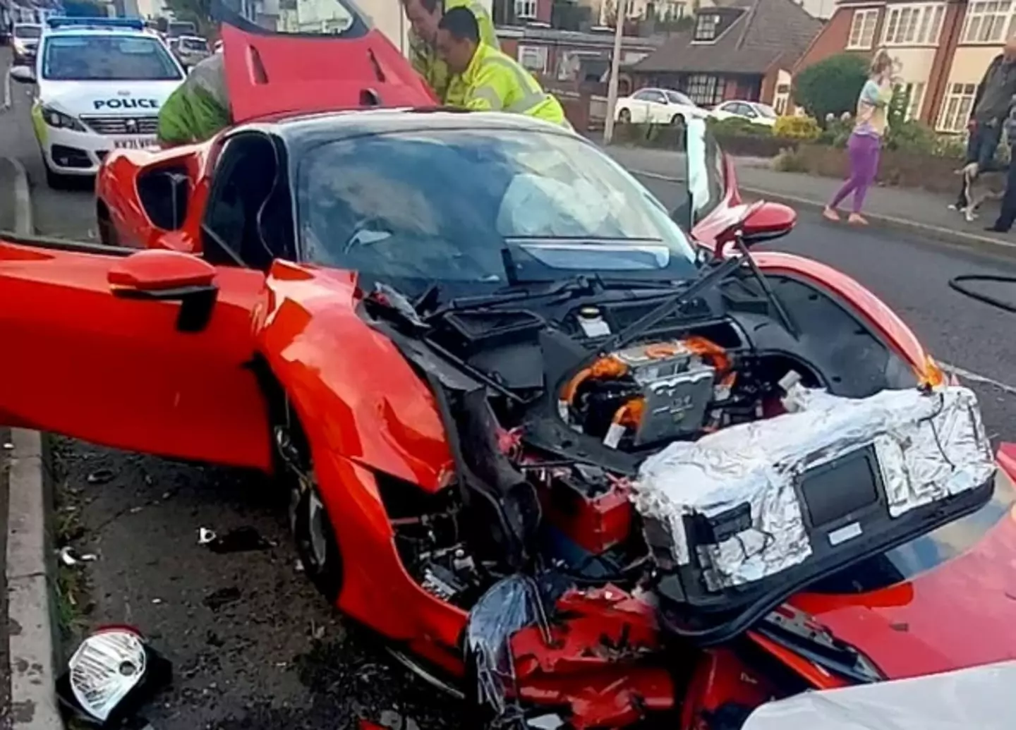 The front of the Ferrari was left crumpled following the crash.