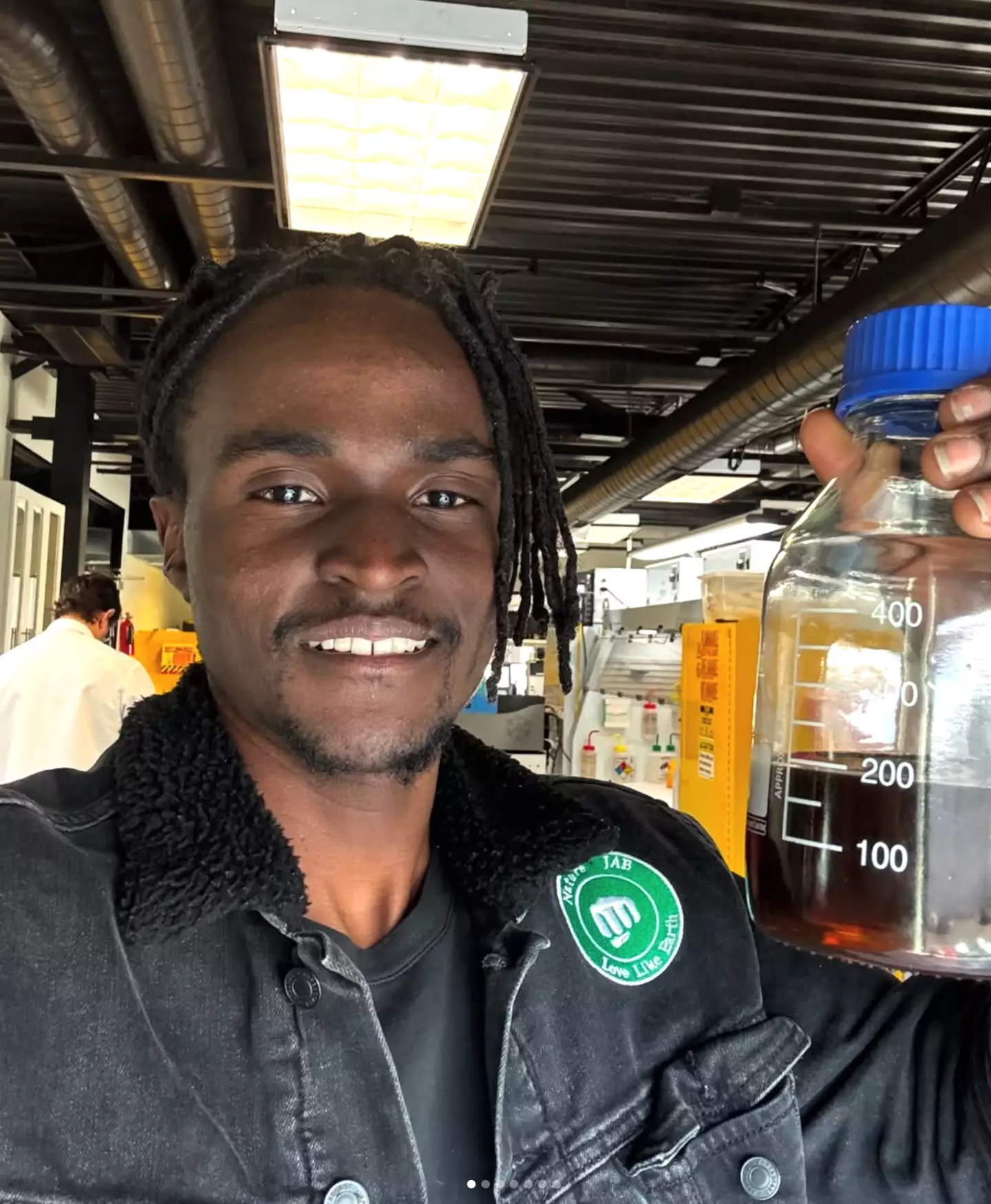 Julian holding the diesel he made from plastic waste (NatureJab/Instagram)