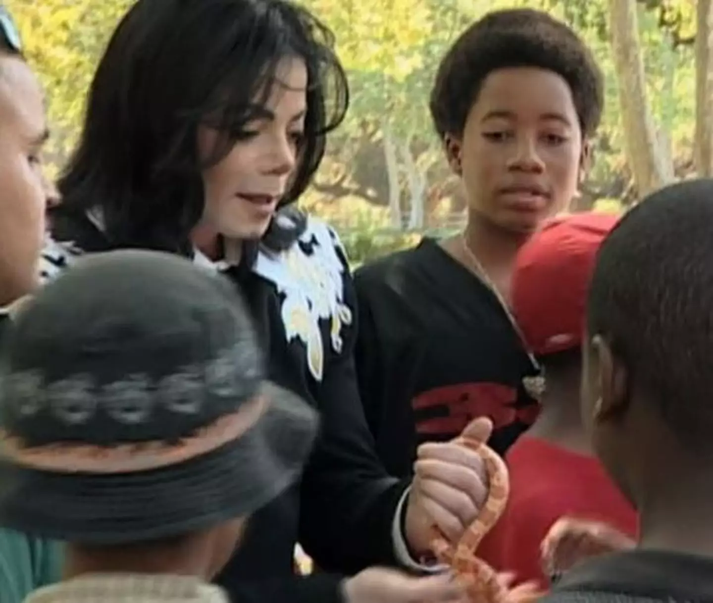 Michael Jackson seen with a snake at his former California home.
